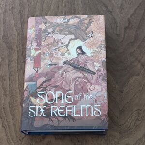Song of the Six Realms Hardcover Book